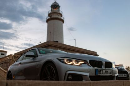 4er BMW am Cap Formentor mit Leuchtturm